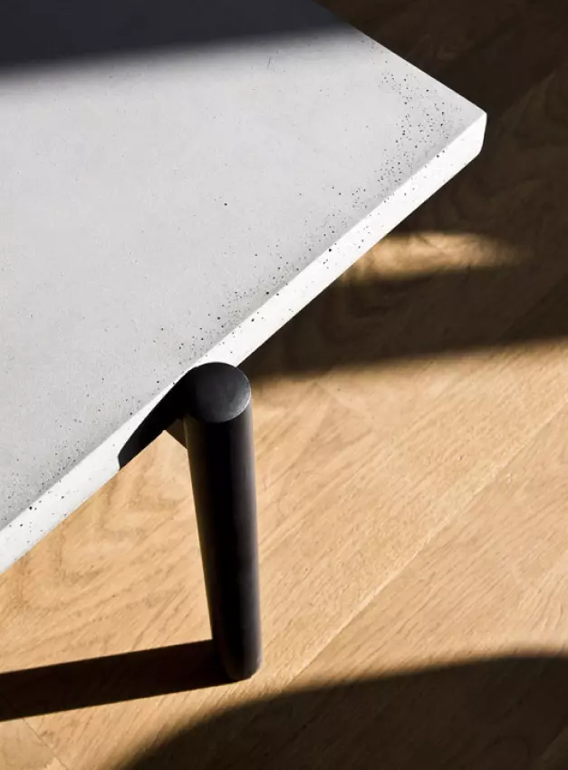 detail of the concrete top of the Twist coffee table by designer Alexandre Dubreuil for Lyon béton