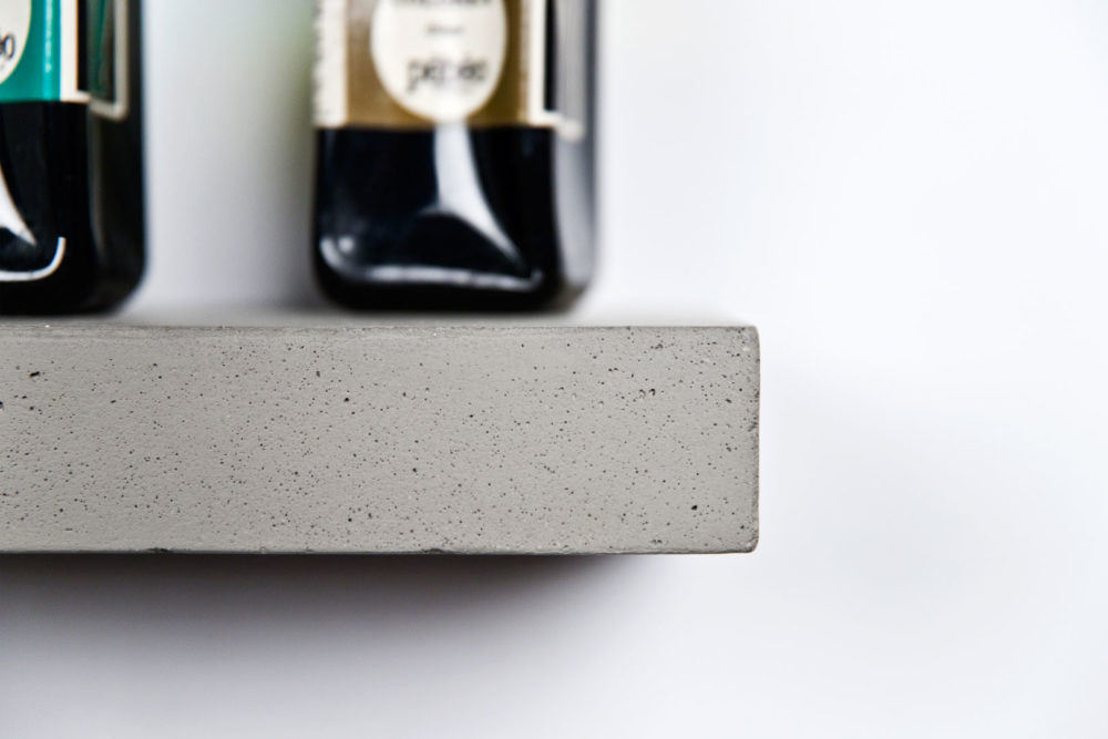Focus on the details of the concrete topped with Pebeo ink bottle