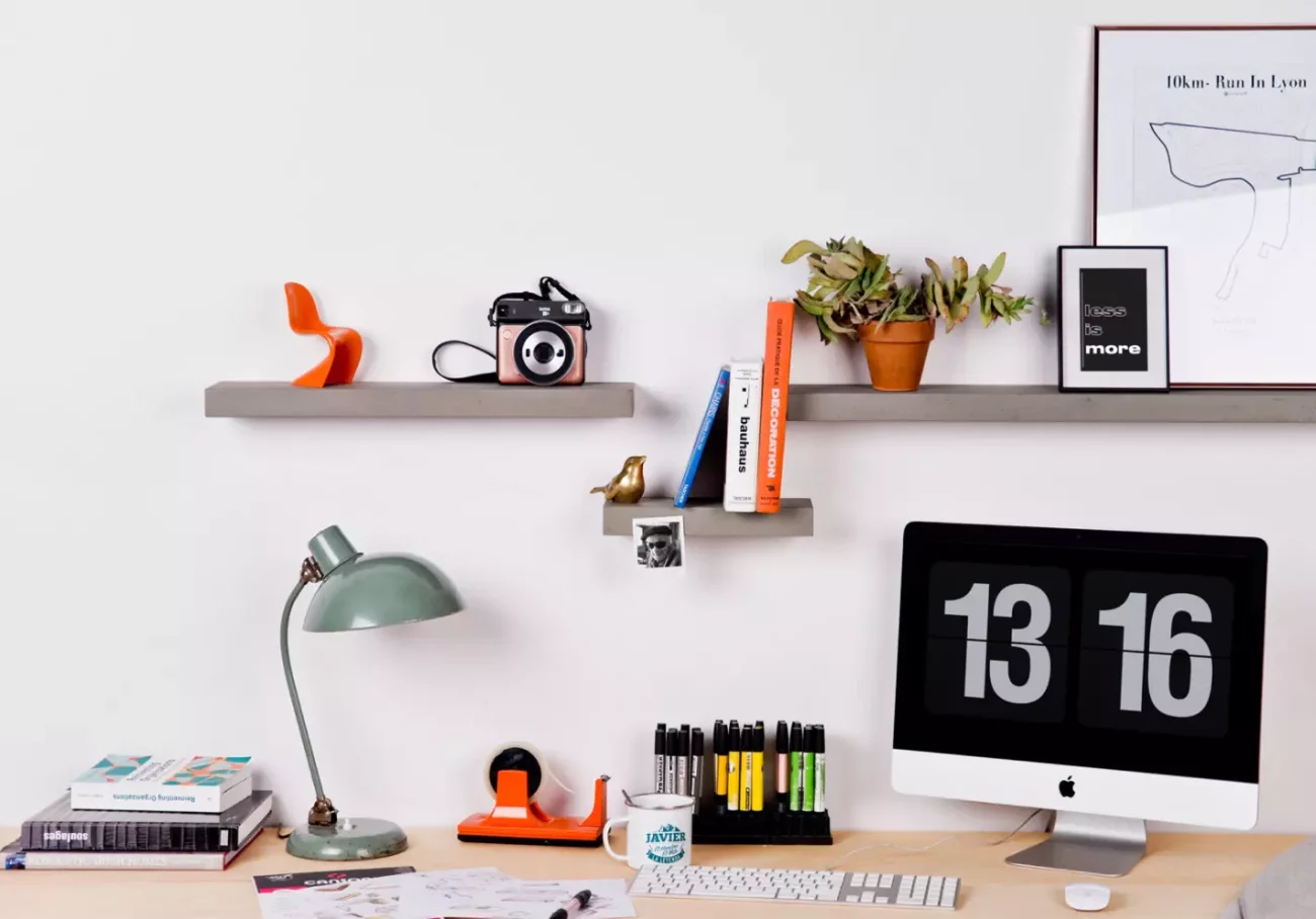 Sliced concrete shelf triptych for invisible mounting over a wooden desk