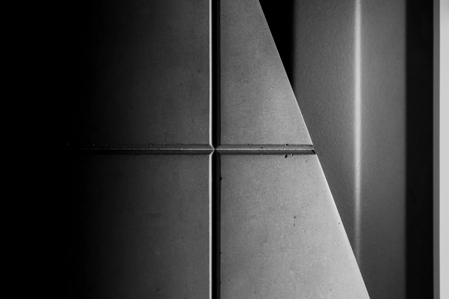 Brutalist detail of the concrete foot of the Sharp dining table by designer Bertrand Jayr